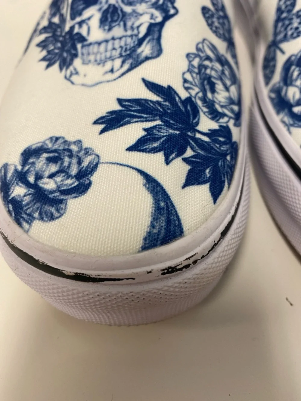 White Slip-On Women’s Sneakers with Blue Skull & Floral Print - Picture 2 of 5